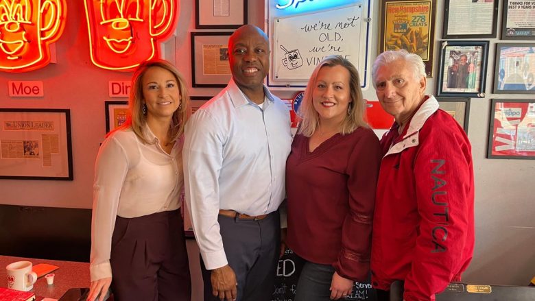 As part of the Faith in America Tour, Senator Tim Scott was in NH at Red Arrow Diner in Manchester. He ordered the Red Arrow Omelette with Spinach and Grits, then posed for a picture with Red Arrow Diner Co-Owners, Amanda Wihby and George Lawrence, along with Red Arrow General Manager, Jamie McKenzie.