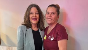 Marianne Williamson poses with Red Arrow Diner waitress. Democratic Presidential Candidate in 2024 at Red Arrow Diner in Manchester, New Hampshire.